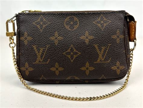 louis vuitton monogram canvas mini pochette accessoires m58009